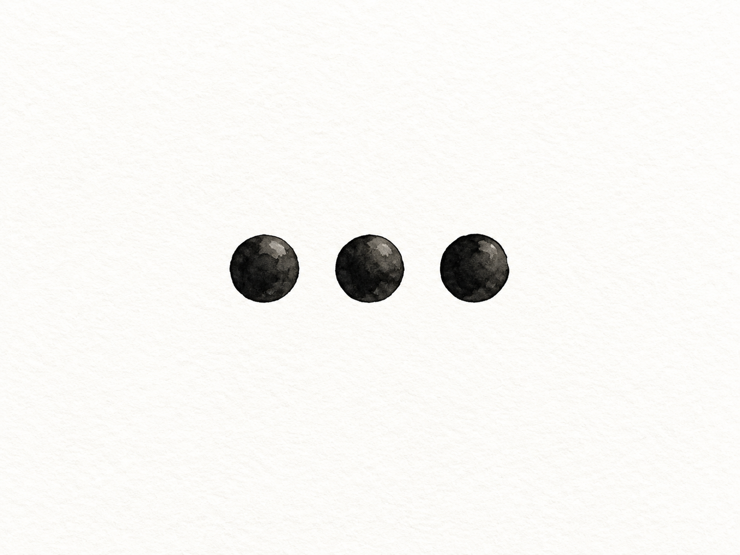 A close view of blank cream paper with exactly three large black dots centered in a horizontal row: .