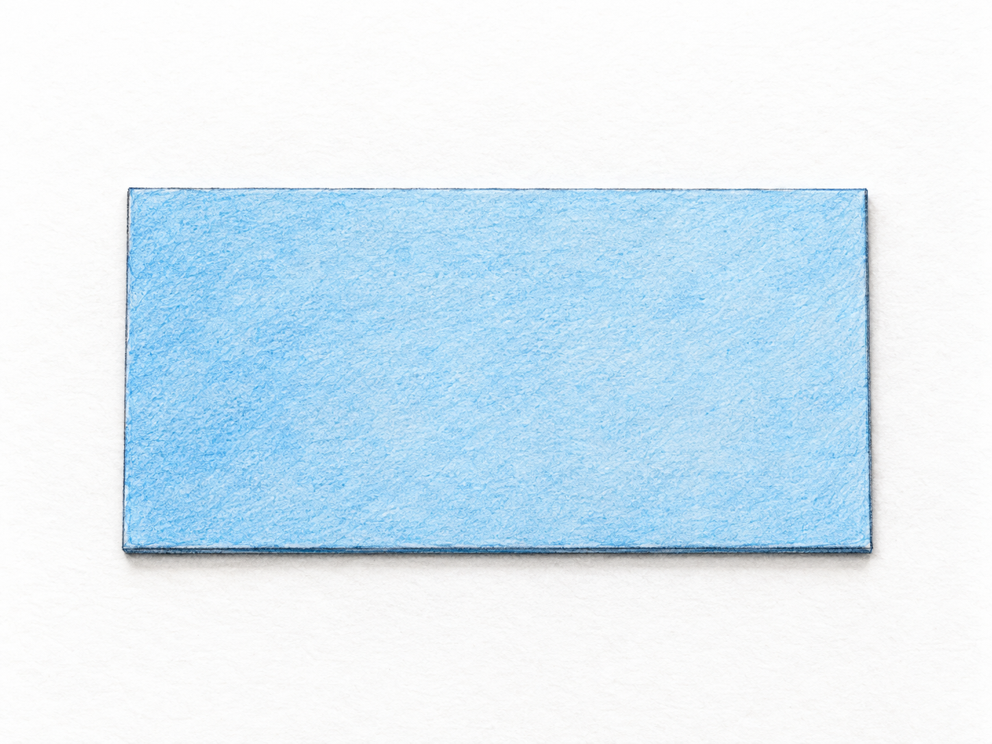 One thin blue rectangular card lying flat, viewed directly from above, twice as wide as tall.